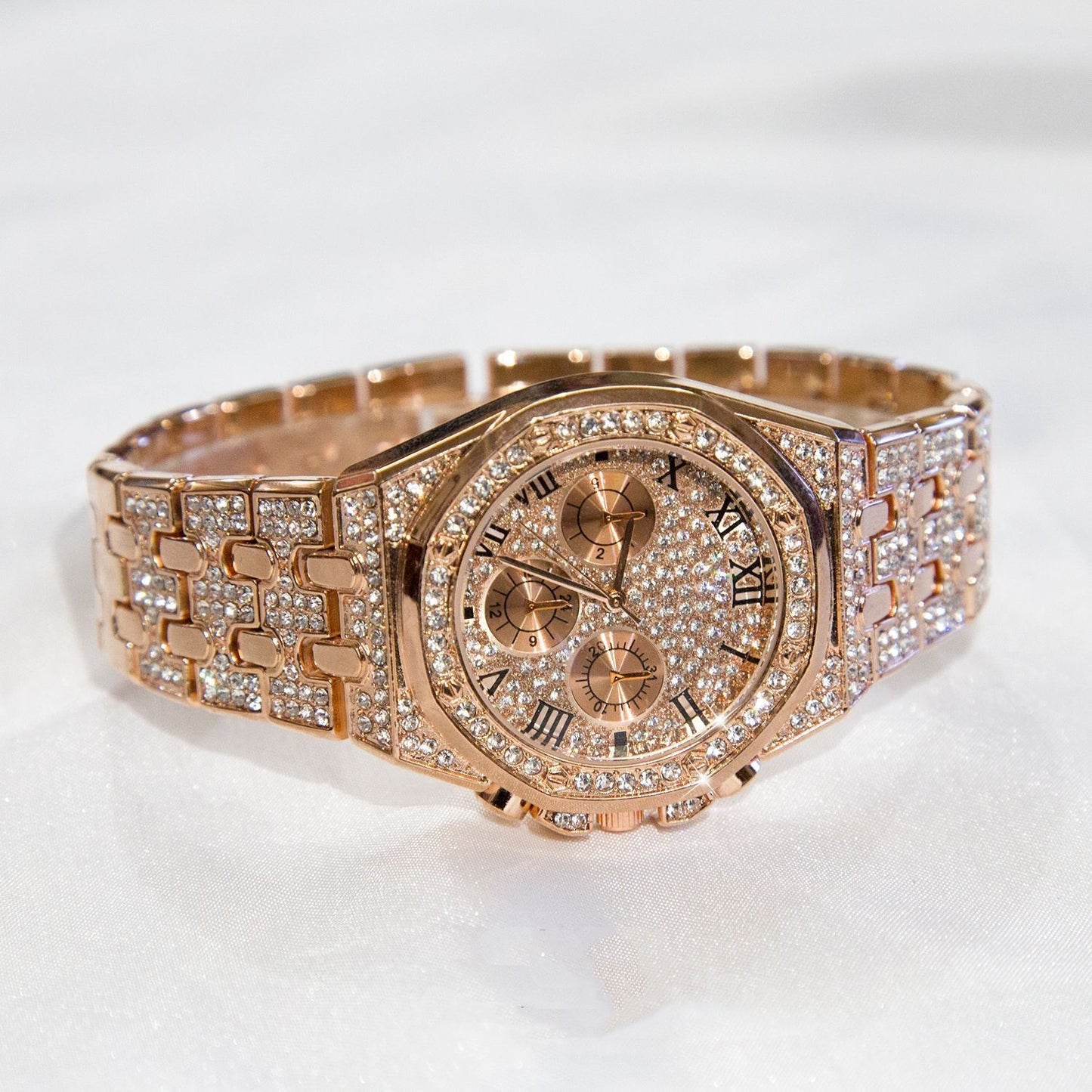 Watch with big dial full of diamonds and stars