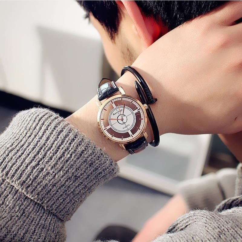 Double-sided cross cutout watch